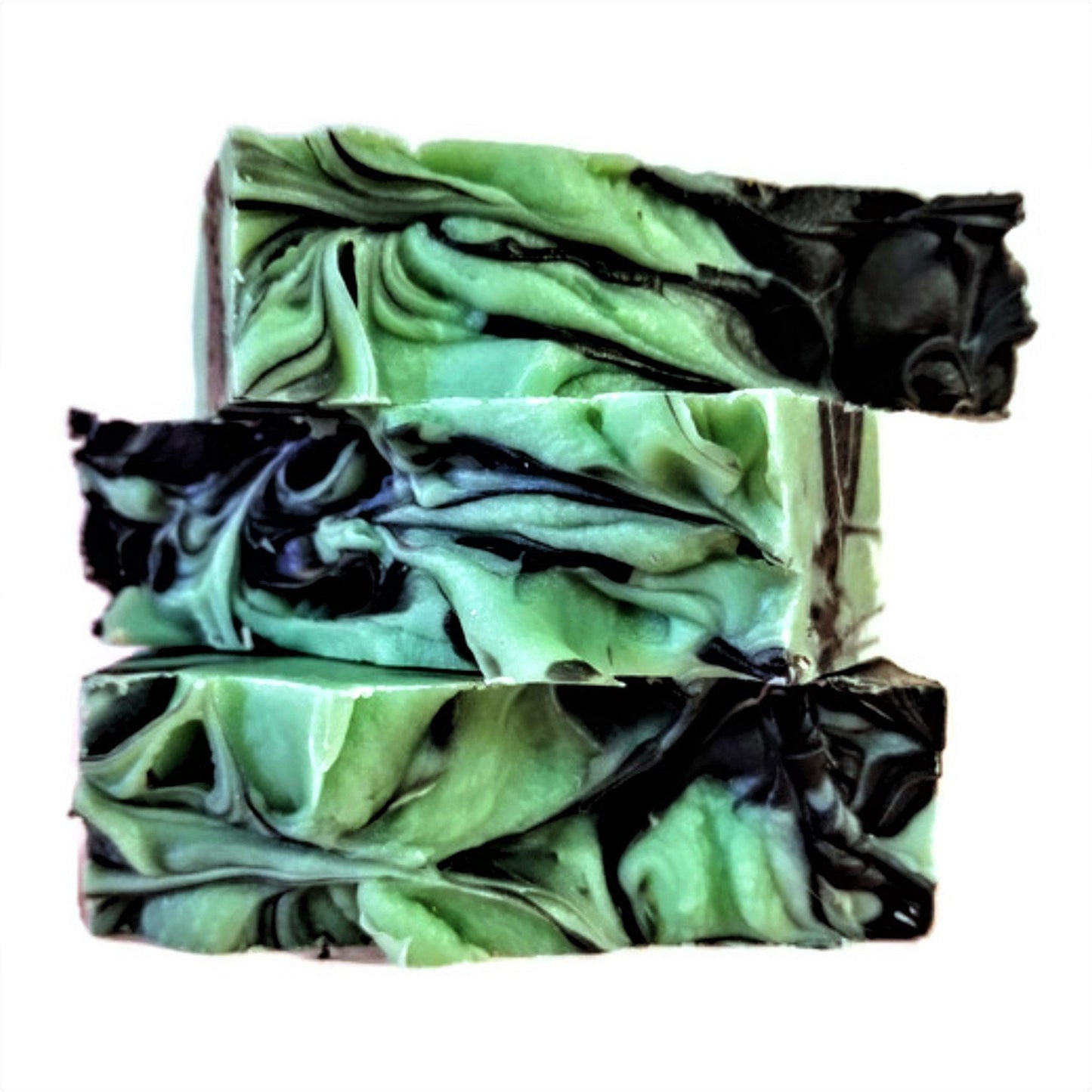 Charcoal Mint Soap β Detox Meets Refresh - With mesmerizing swirls of seafoam green, crisp white, and detoxifying black, this bar is a showstopper β and a skin savior.