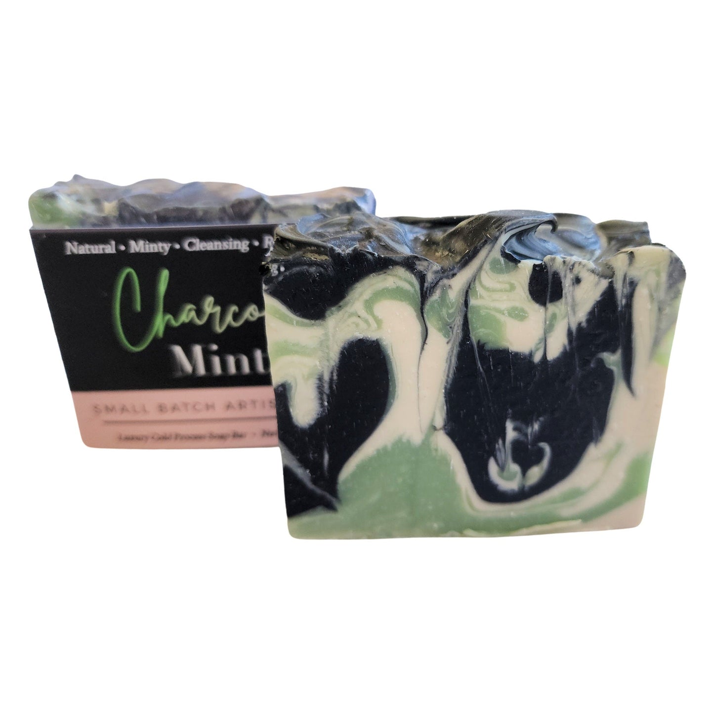Charcoal Mint Soap β Detox Meets Refresh - With mesmerizing swirls of seafoam green, crisp white, and detoxifying black, this bar is a showstopper β and a skin savior.