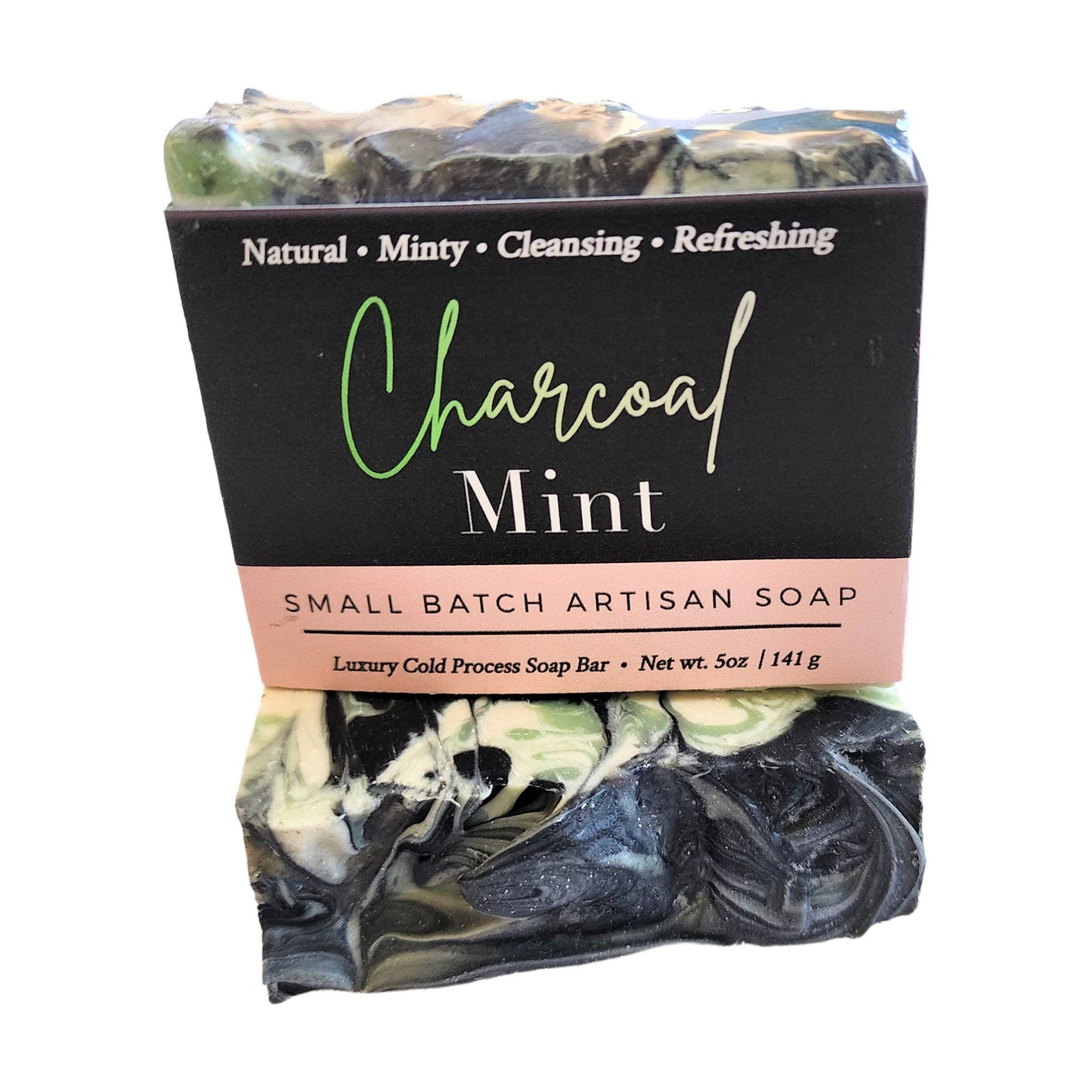 Charcoal Mint Soap β Detox Meets Refresh - With mesmerizing swirls of seafoam green, crisp white, and detoxifying black, this bar is a showstopper β and a skin savior.