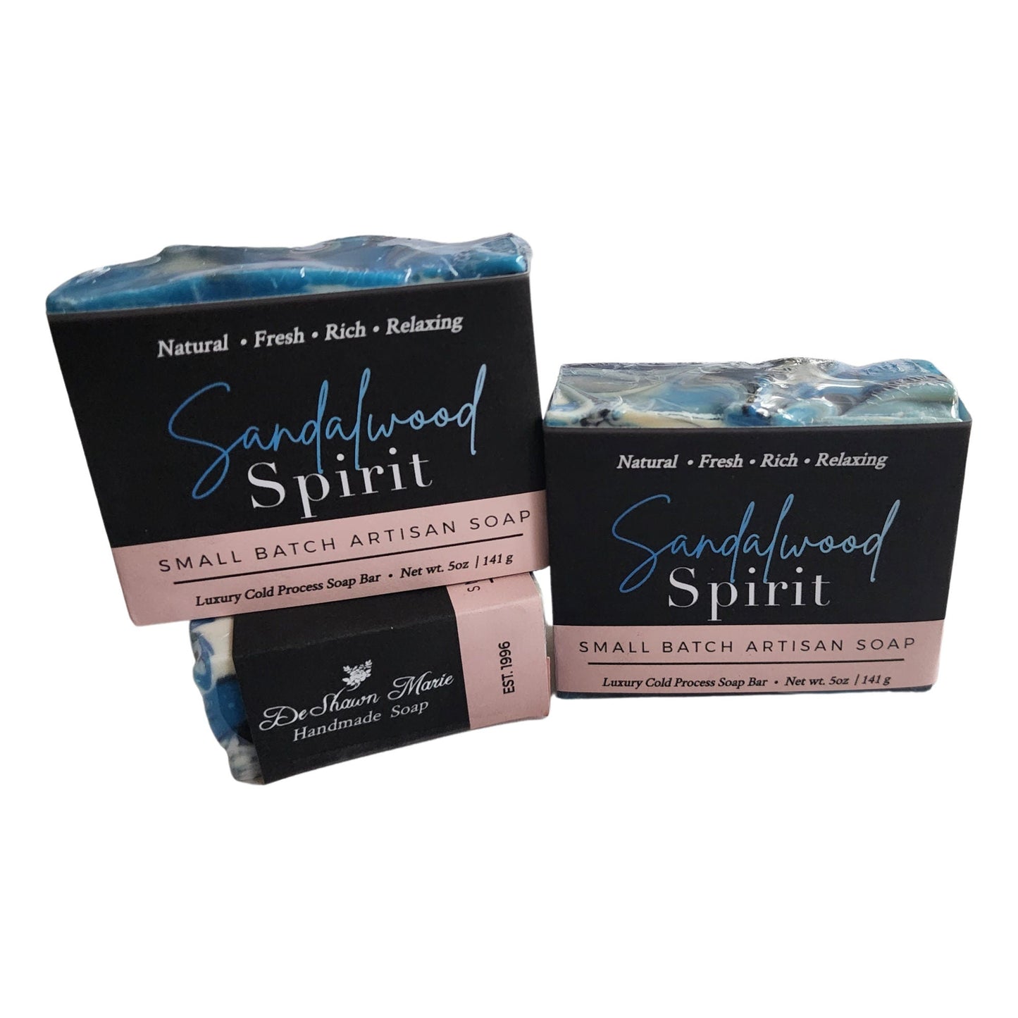 Sandalwood Spirit Soap – Earthy. Elegant. Enchanting a handcrafted, cold-process bar that soothes the soul and skin alike. Swirled in deep oceanic blues with activated charcoal and kaolin clay