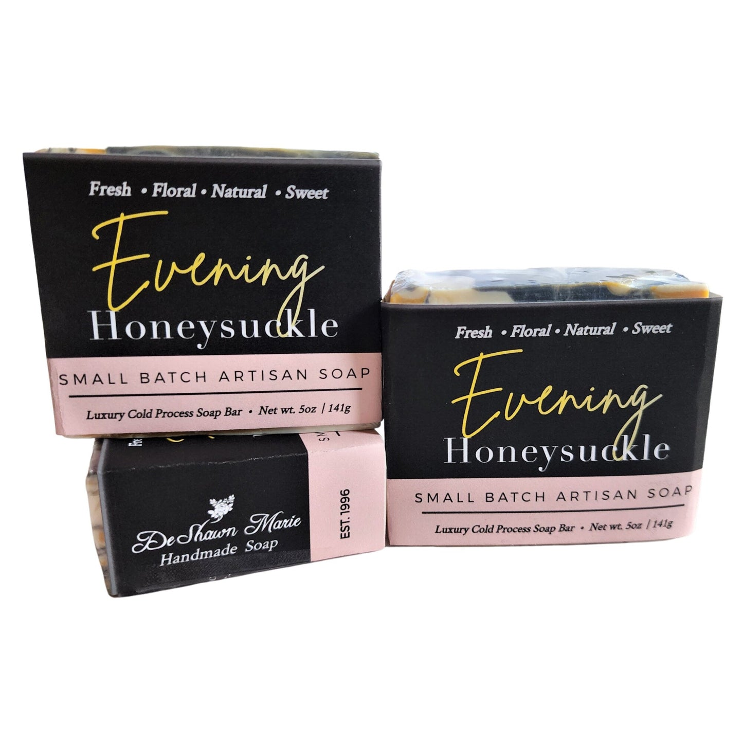 Evening Honeysuckle Soap - captures the soft, floral sweetness of honeysuckle in the evening air. Featuring rich yellow, beachy white, and gunmetal grey swirls.